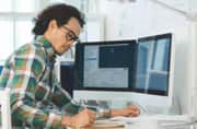 Image of user looking at software on a screen