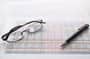 image of glasses and a pen.jpg