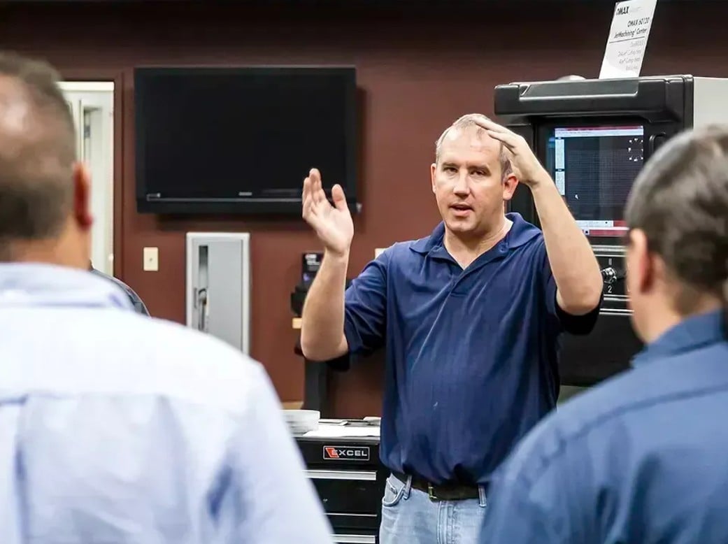 people discussing waterjet technology