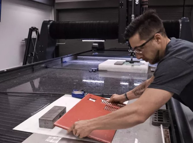 Image of OMAX waterjet employee