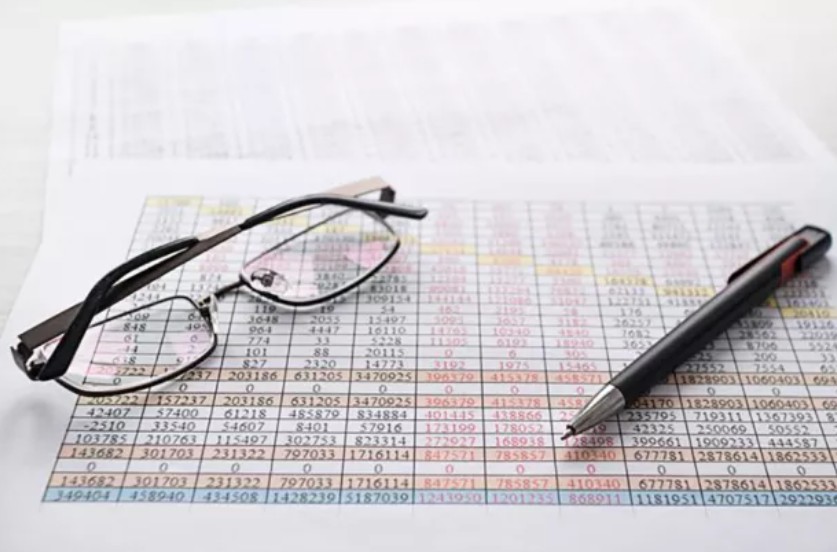 image of glasses and a pen.jpg
