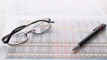 image of glasses and a pen.jpg