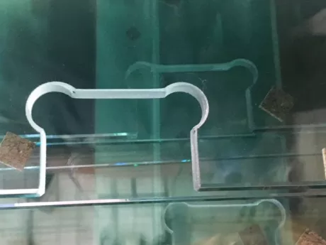 Cutting notches from glass with a waterjet