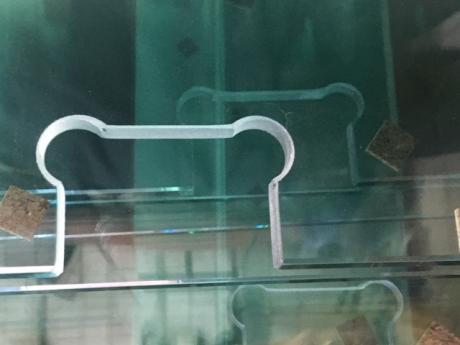Cutting notches from glass with a waterjet