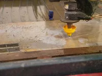 Animax Designs from Nashville, TN, uses a MAXIEM 1530 abrasive waterjet water jet cutter in this 2021 article from the Fabricator magazine