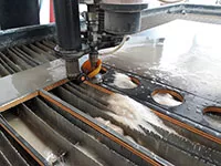Abrasive Waterjet Automation Cuts Production Time and Scrappage Rates for Manufacturer of Stainless Steel Equipment